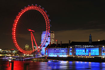 London at night time with view of the London Eye