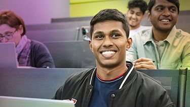 Students studying in a lecture theatre