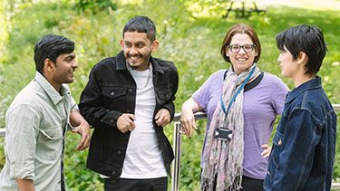 Students socialising outside on campus