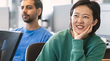 Male and female student in classroom
