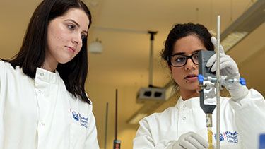 Female students working in a science lab
